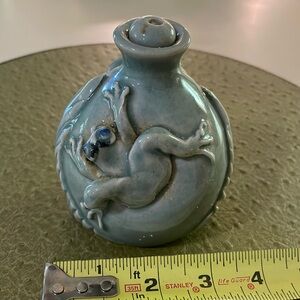 Hand built ceramic oil burner with frogs
